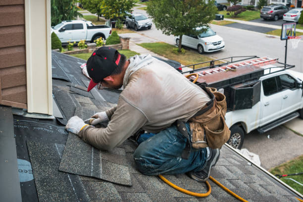Professional Roofing technician working in Grove City, PA